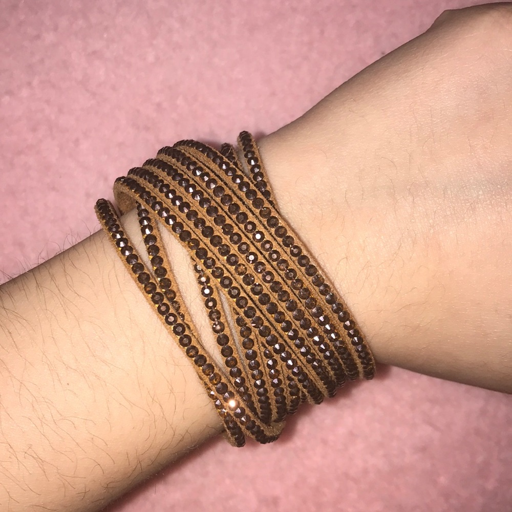 Faux suede wrap bracelet w/ lots of rhines…